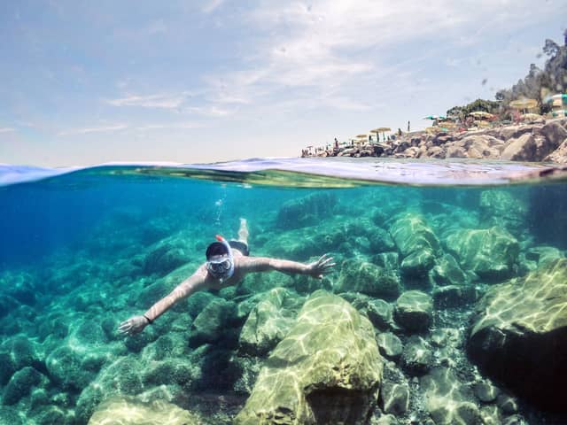 Swim and snorkel the crystal coves of Ibiza